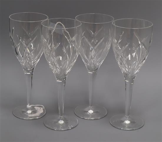 A set of four Waterford John Rocha Signature cut glass wine glasses height 25cm